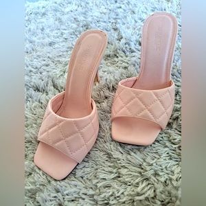 Truffle Collection quilted heeled mules